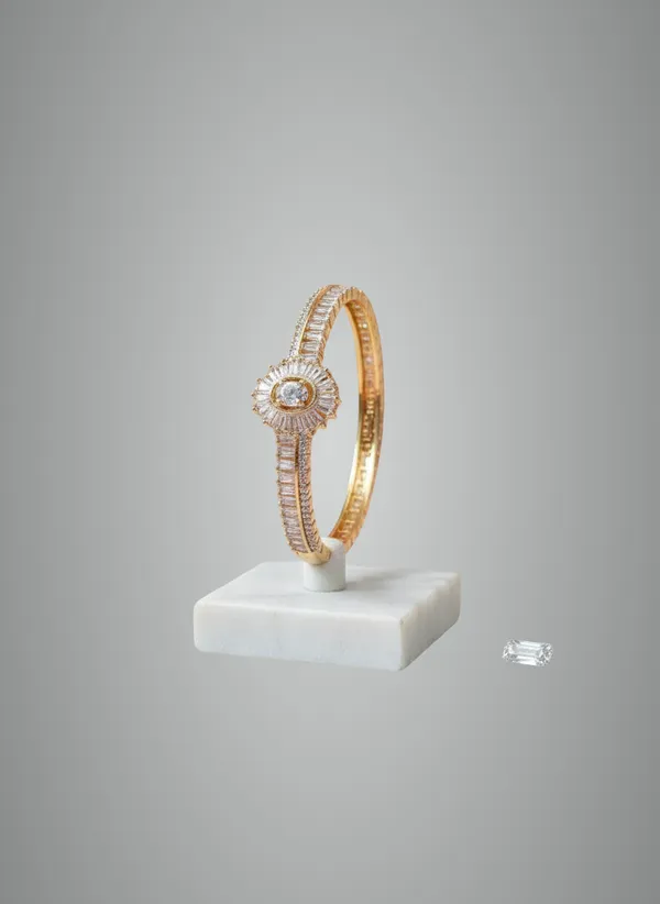 Elegant_Silver_Toned_Floral_Bangle_Bracelet_With_Baguette_Stone_Detailing