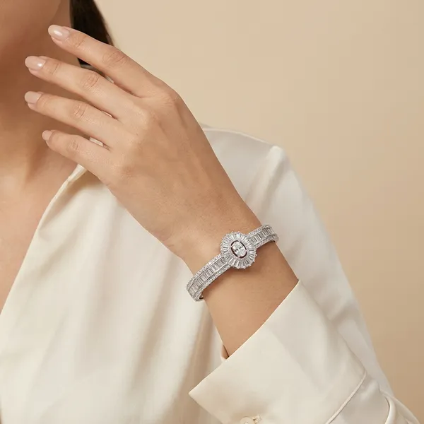 Elegant_Silver_Toned_Floral_Bangle_Bracelet_With_Baguette_Stone_Detailing