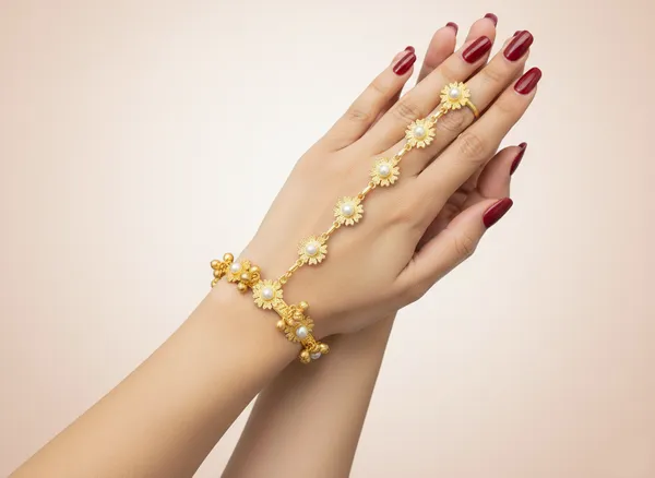 Gold_Toned_Floral_Hand_Chain_Bracelet_With_Ring_For_Women