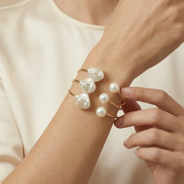Gold_Toned_Pearl_Terminal_Adjustable_Bangles_With_Decorative_Pearl_Charms_Set_Of_2