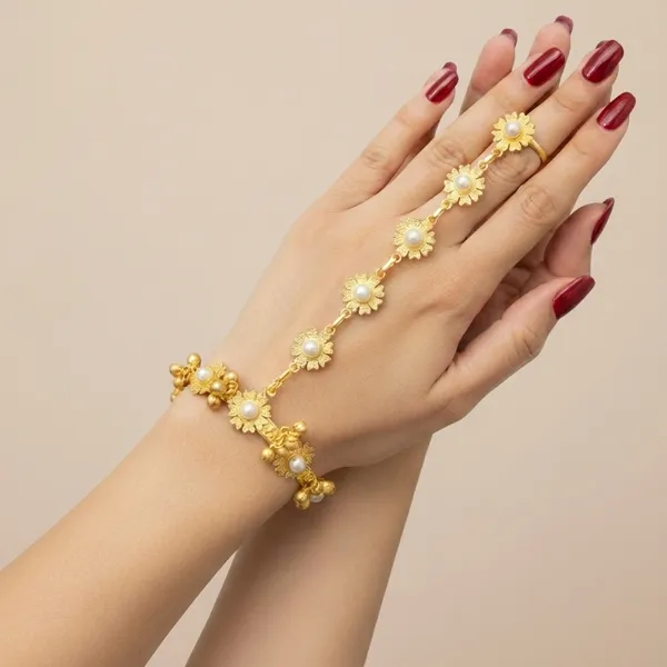 Gold_Toned_Floral_Hand_Chain_Bracelet_With_Ring_For_Women
