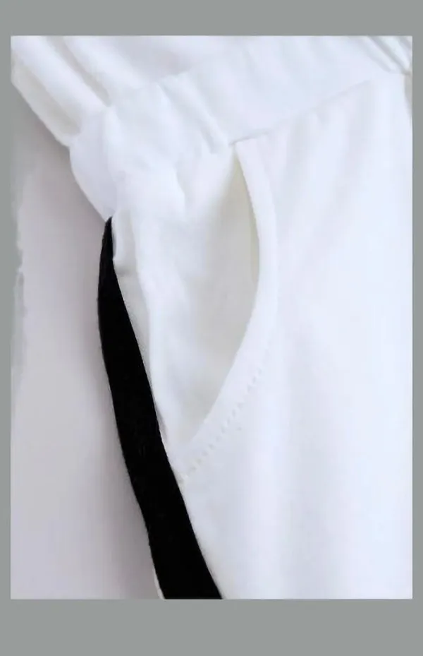 White_Cotton_Blend_Self_Design_Regular_Jumpsuit_For_Girls