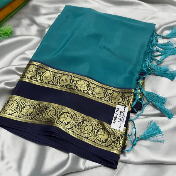 Contest_Semi_Crepe_Silk_Saree_With_Peacock_Bentex_Border
