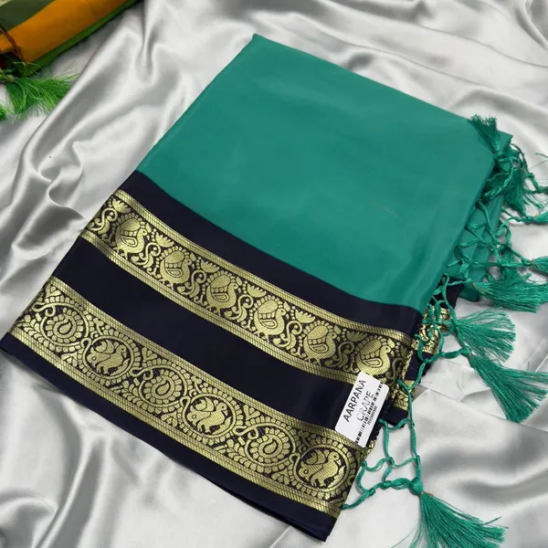 Contest_Semi_Crepe_Silk_Saree_With_Peacock_Bentex_Border