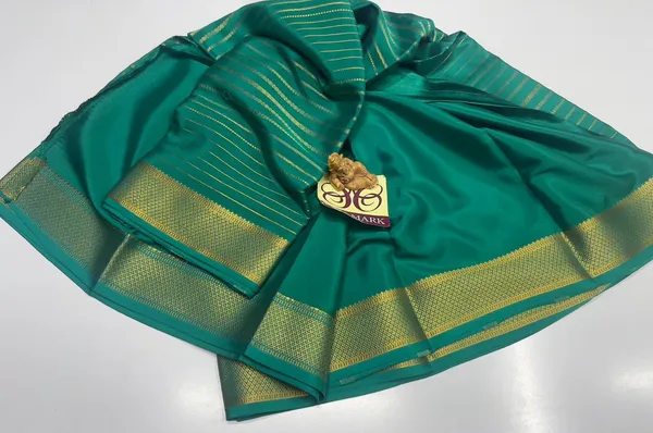 Green_Self_Pure_Crepe_Silk_Sarees_With_Silk_Mark_Pure_Mysore_Crepe_Silk_Sarees_With_Running_Blouse_Piece