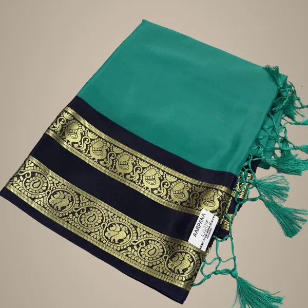 Contest_Semi_Crepe_Silk_Saree_With_Peacock_Bentex_Border