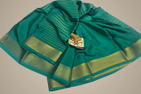 Green_Self_Pure_Crepe_Silk_Sarees_With_Silk_Mark_Pure_Mysore_Crepe_Silk_Sarees_With_Running_Blouse_Piece