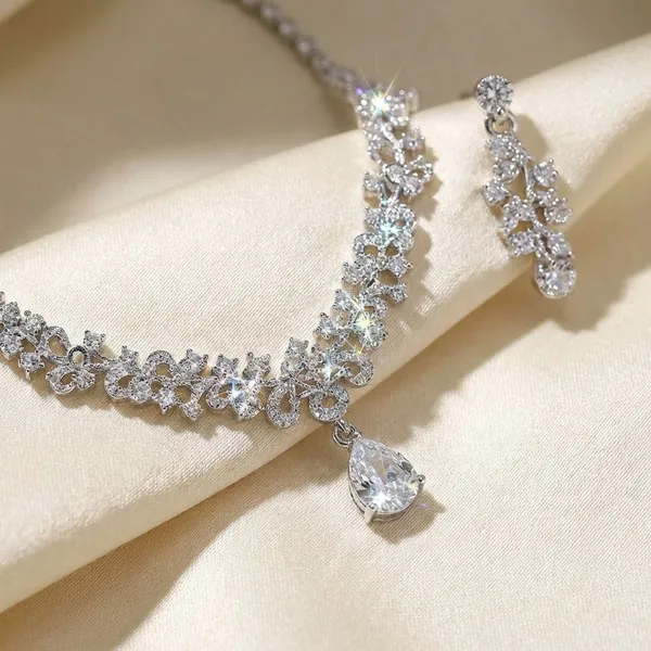 Silver_American_Diamond_And_Metal_Alloy_Wedding_And_Bridal_And_Festive_And_Party_And_Reception_Necklace_Set_With_Earrings_For_Women