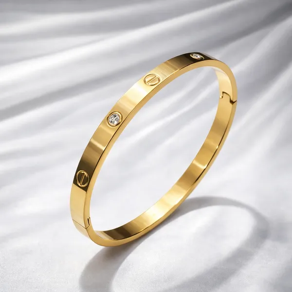 Signature_Screw_Motif_Kada_–_18K_Gold_Plated_Elegance_by_Jauhré