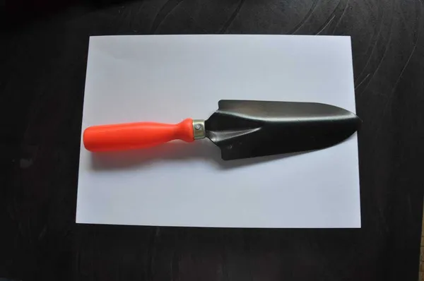 Orange_And_Black_Hand_Trowel_Green_Gardening_Tools_(1_Tools)