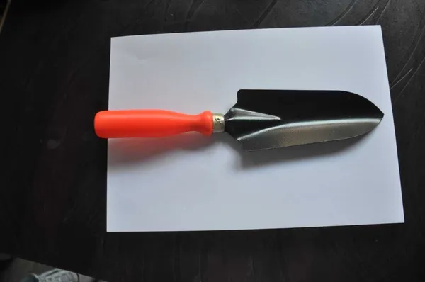 Orange_And_Black_Hand_Trowel_Green_Gardening_Tools_(1_Tools)