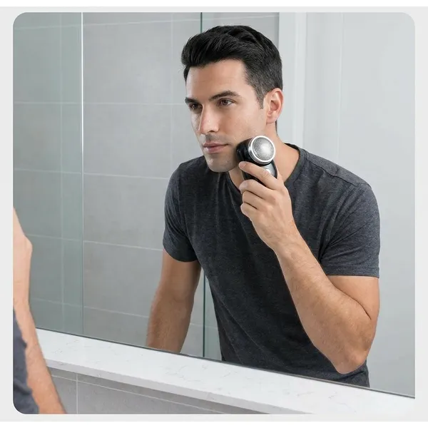 Portable_Electric_Shaver_With_Rotary_Blades_And_SingleButton_Control