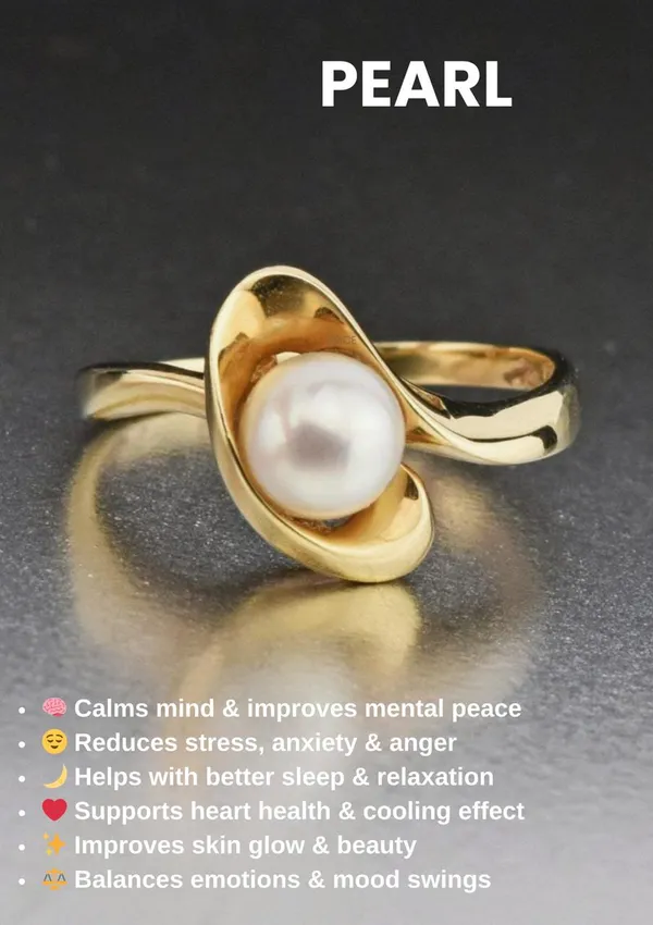 Elegant_Gold_Toned_Pearl_Ring_With_Contemporary_Wave_Design
