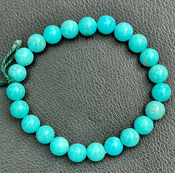 Blue_Turquoise_Beaded_Bracelet_With_Adjustable_Green_Cord_For_Unisex