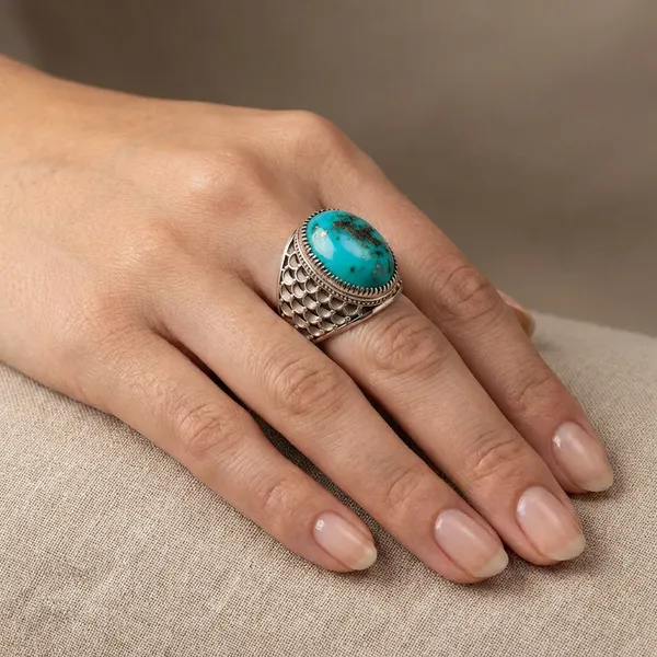 Turquoise_Stone_Statement_Ring_With_Ornate_Silver_Tone_Setting