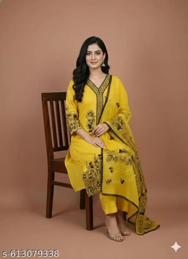 Yellow_Muslin_Fabric_Unstitched_Suit_With_Net_Dupatta_And_Unstitched_Rayon_Bottom_For_Women