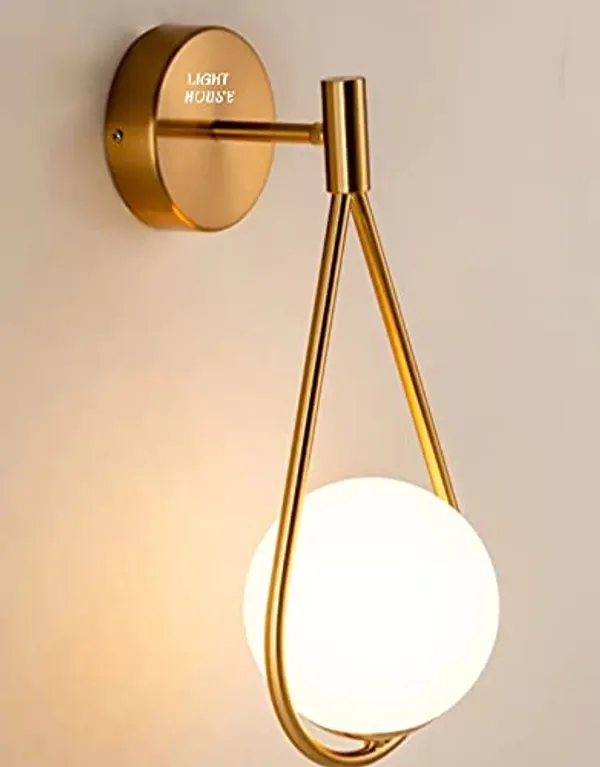 Gold_Metal_And_Glass_Wall_Light_For_Home_And_Kitchen