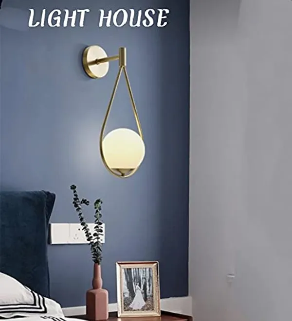 Gold_Metal_And_Glass_Wall_Light_For_Home_And_Kitchen