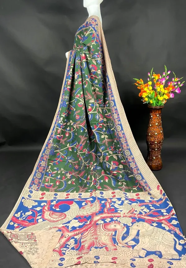 Elegant_Green_Kalamkari_Printed_Saree_With_Artistic_Border