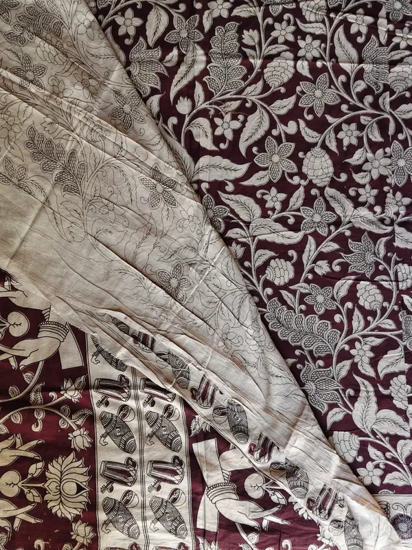 Maroon_Kalamkari_Printed_Saree_With_Traditional_Border_And_Floral_Design