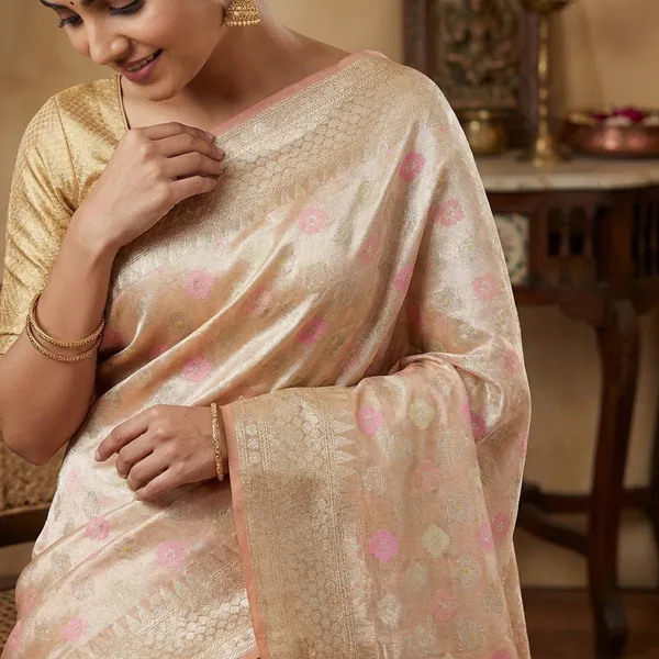Soft_Golden_Tissue_Saree_With_Floral_Weaving