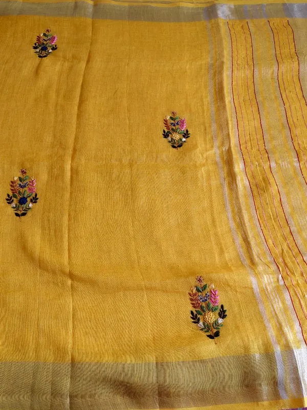 Pure_Linen_Mustard_Yellow_Saree_With_Exquisite_Hand_Embroidery_And_Silver_Zari_Border