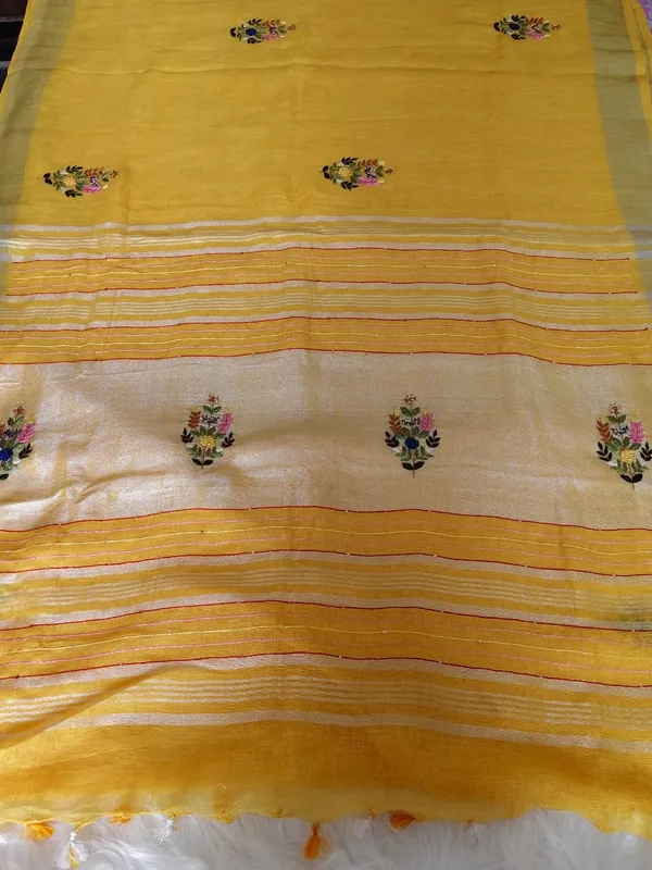 Pure_Linen_Mustard_Yellow_Saree_With_Exquisite_Hand_Embroidery_And_Silver_Zari_Border