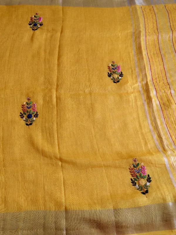 Pure_Linen_Mustard_Yellow_Saree_With_Exquisite_Hand_Embroidery_And_Silver_Zari_Border