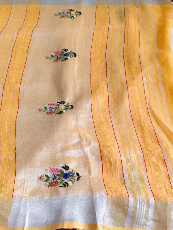 Pure_Linen_Mustard_Yellow_Saree_With_Exquisite_Hand_Embroidery_And_Silver_Zari_Border