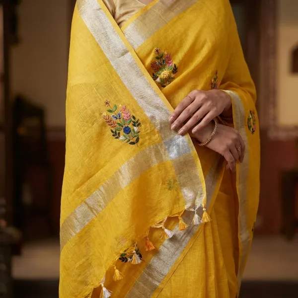 Pure_Linen_Mustard_Yellow_Saree_With_Exquisite_Hand_Embroidery_And_Silver_Zari_Border