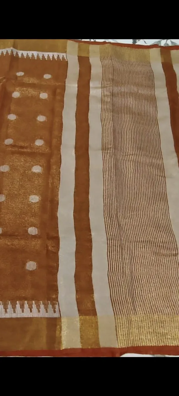 Elegant_Pure_Linen_Tissue_Saree_–_Copper_Brown_With_Silver_Zari_Accents