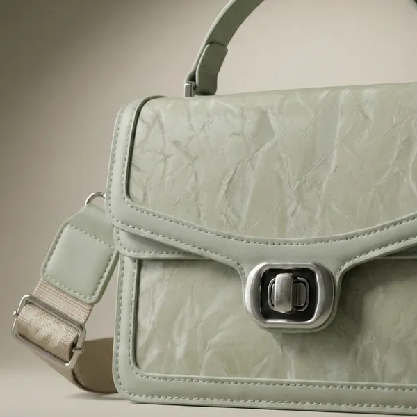Sage_Green_Structured_Luxury_with_Signature_Lock_and_Premium_Wide_Strap_Handbag_For_Women