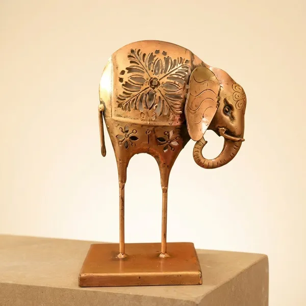 Golden_Majesty_Decorative_Elephant_Figurine_With_Intricate_Floral_Design
