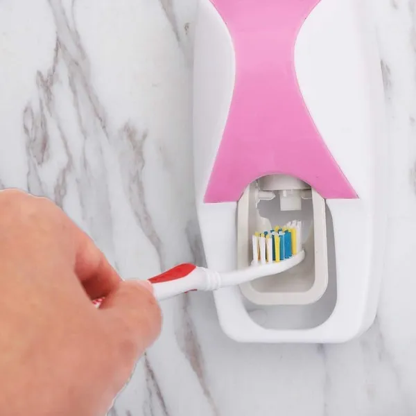 Pink_Wall_Mounted_Automatic_Toothpaste_Dispenser_With_Toothbrush_Holder_Set