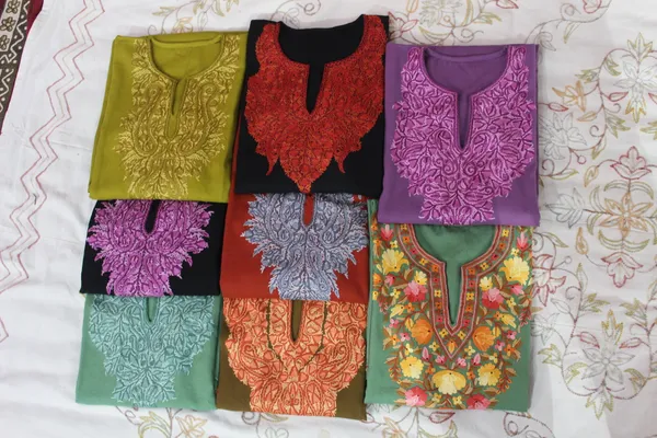 Black_Woolen_Kurti_With_Pink_Embroidered_Neckline