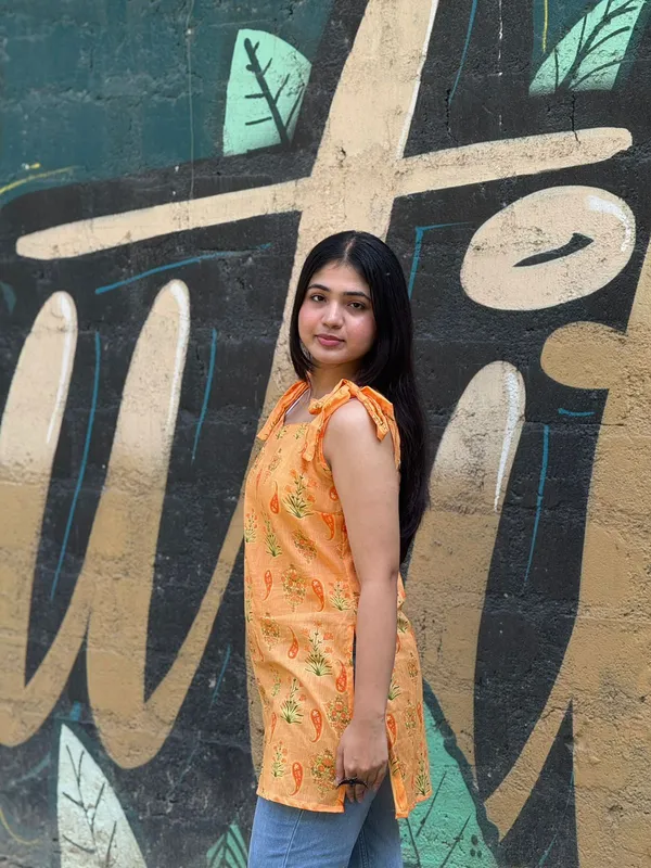Orange_Floral_Printed_Cotton_Kurti_With_Tie_Up_Shoulder_To_Straps_With_Lace_Detailing_At_Back_For_Women