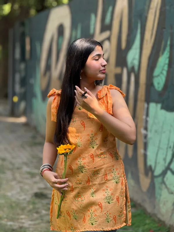 Orange_Floral_Printed_Cotton_Kurti_With_Tie_Up_Shoulder_To_Straps_With_Lace_Detailing_At_Back_For_Women