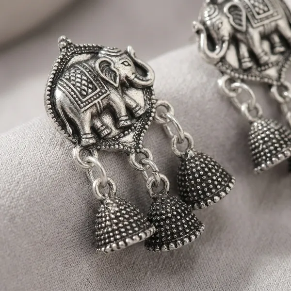 Silver_And_White_Metal_Silver_Peacock_Design_Jhumkis_For_Women