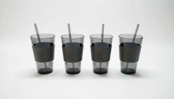 Glass_Tumbler_With_Straw_And_Protective_Sleeve