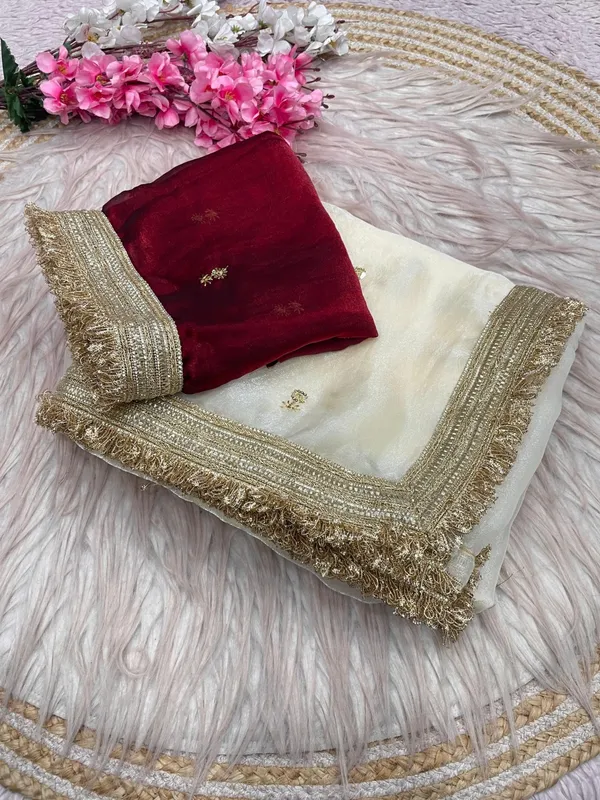 Off_-_White_Elegant_space_satin_saree_with_full_sequence_work_and_contrast_blouse.