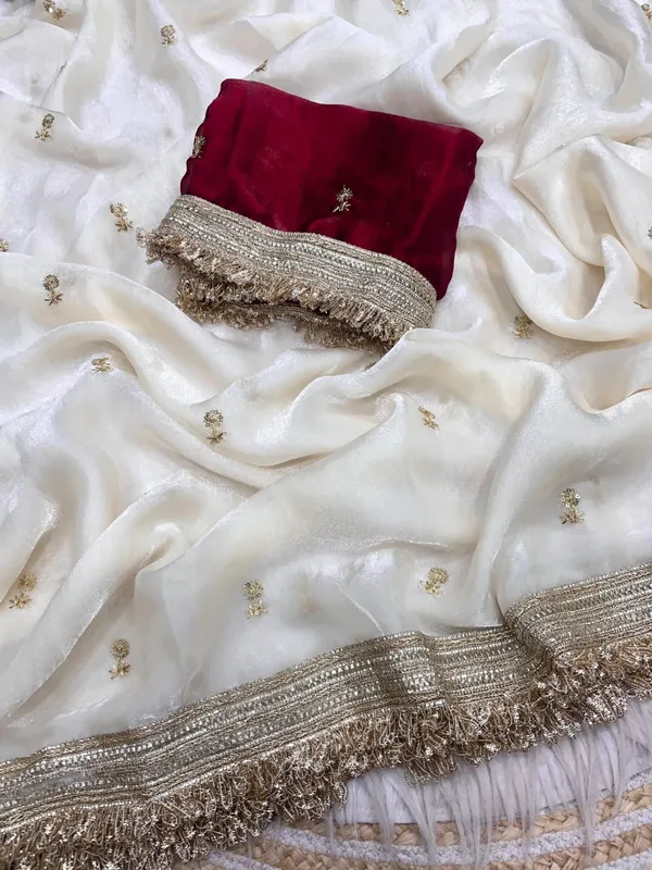 Off_-_White_Elegant_space_satin_saree_with_full_sequence_work_and_contrast_blouse.