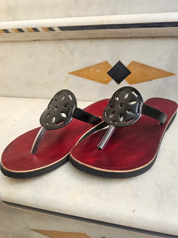 Women_black_cutpunch_leather_rakhi_slippers