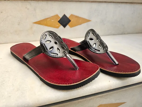 Women_black_cutpunch_leather_rakhi_slippers