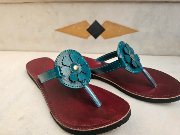 Women_green_flower_leather_rakhi_slippers
