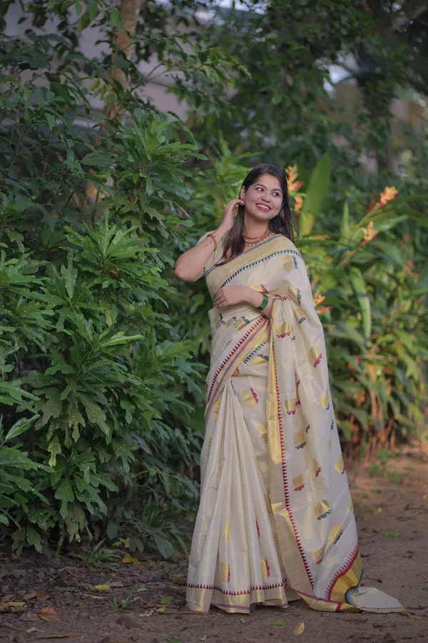 Off-White_Weave_Golden_Tissue_Saree_With_Temple_Borders_And_Yellow_Flower_Embroidery_Saree_For_Women_Pack_Of_2