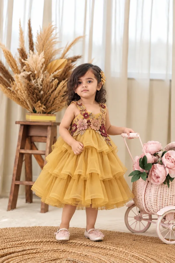 Girls_yellow_frill_festive_dress