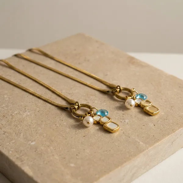 Gold_Plated_Snake_Chain_Necklace_With_Square_Charm_Pendant_And_Pearl_And_Blue_Bead_Accents_For_Women