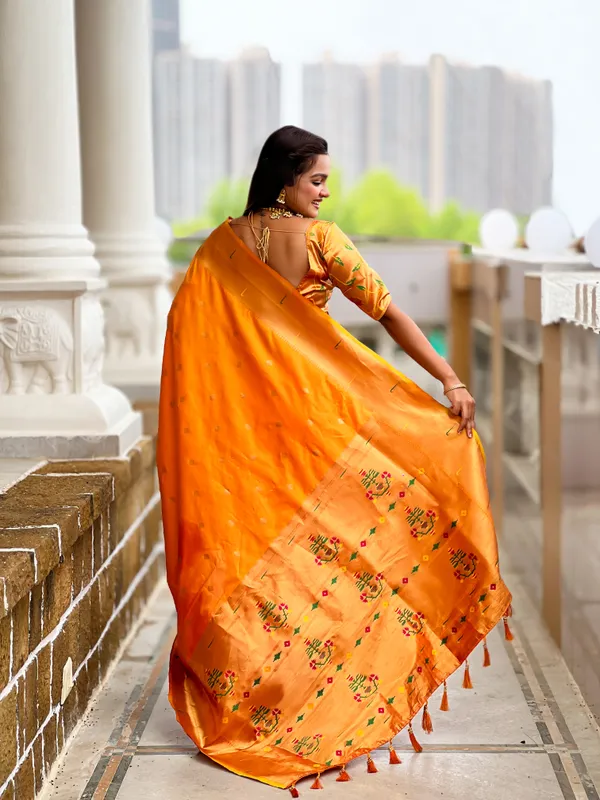 Orange_Raffel_Silk_Saree_With_Unstitched_Blouse_Piece