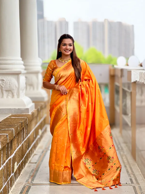 Orange_Raffel_Silk_Saree_With_Unstitched_Blouse_Piece