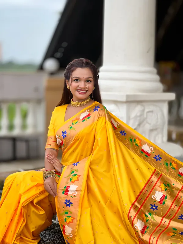 Yellow_Rajhans_Silk_Saree_With_Unstitched_Blouse_Piece